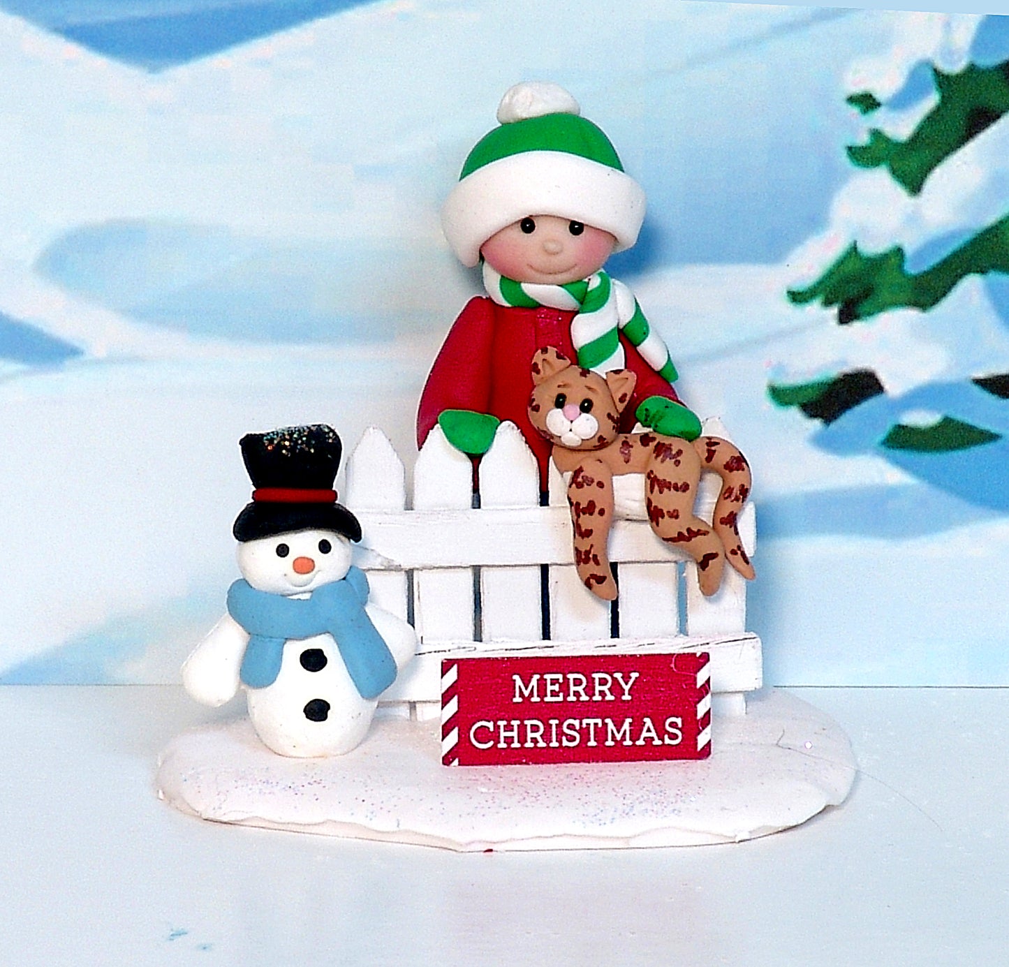Little kid with Orange Kitty Cat on Fence